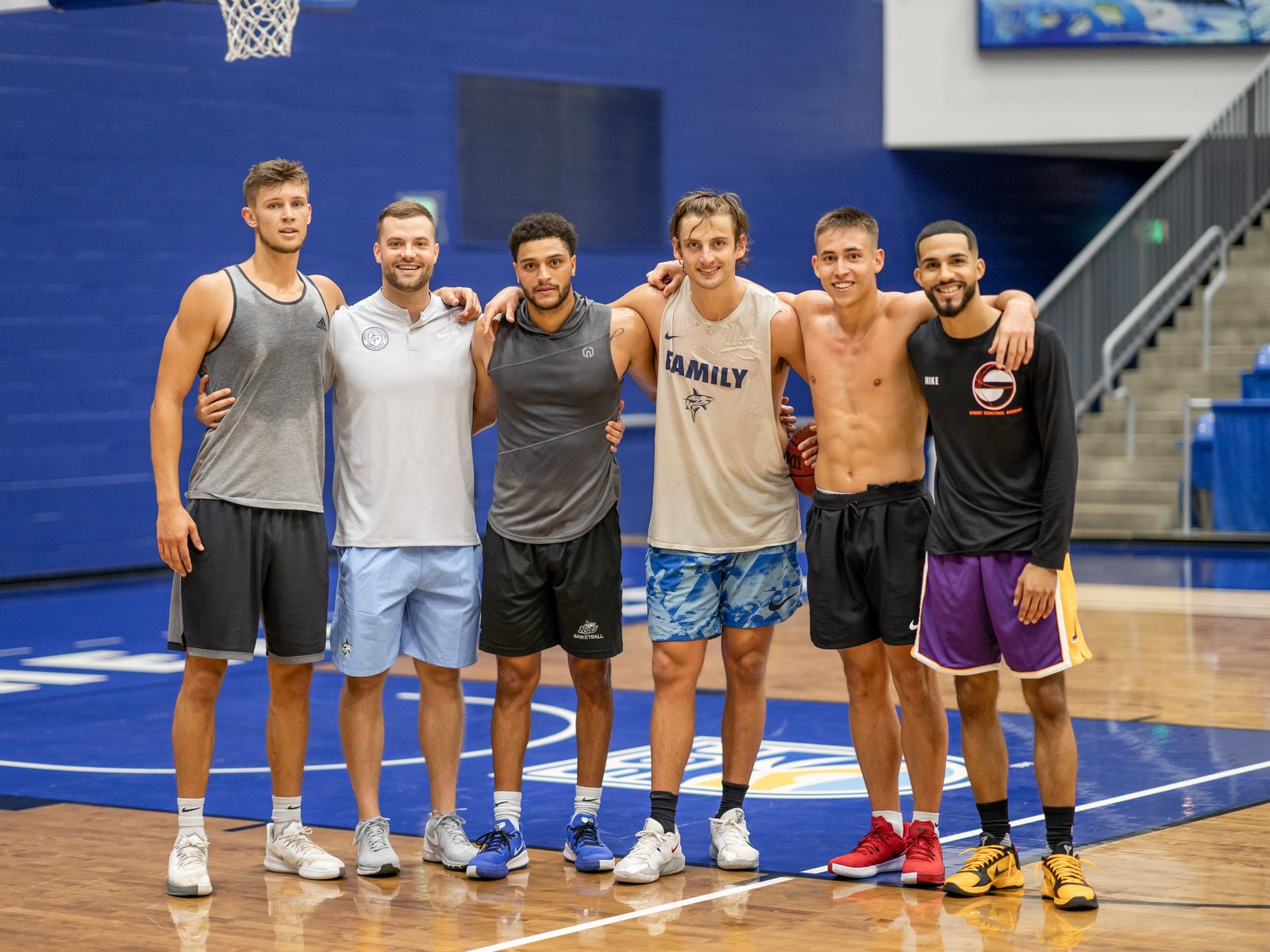 Coach Kaine with Nova Southeastern coaching staff, including associate head coach Nick Smith and Lamar University head coach Jordan Fee